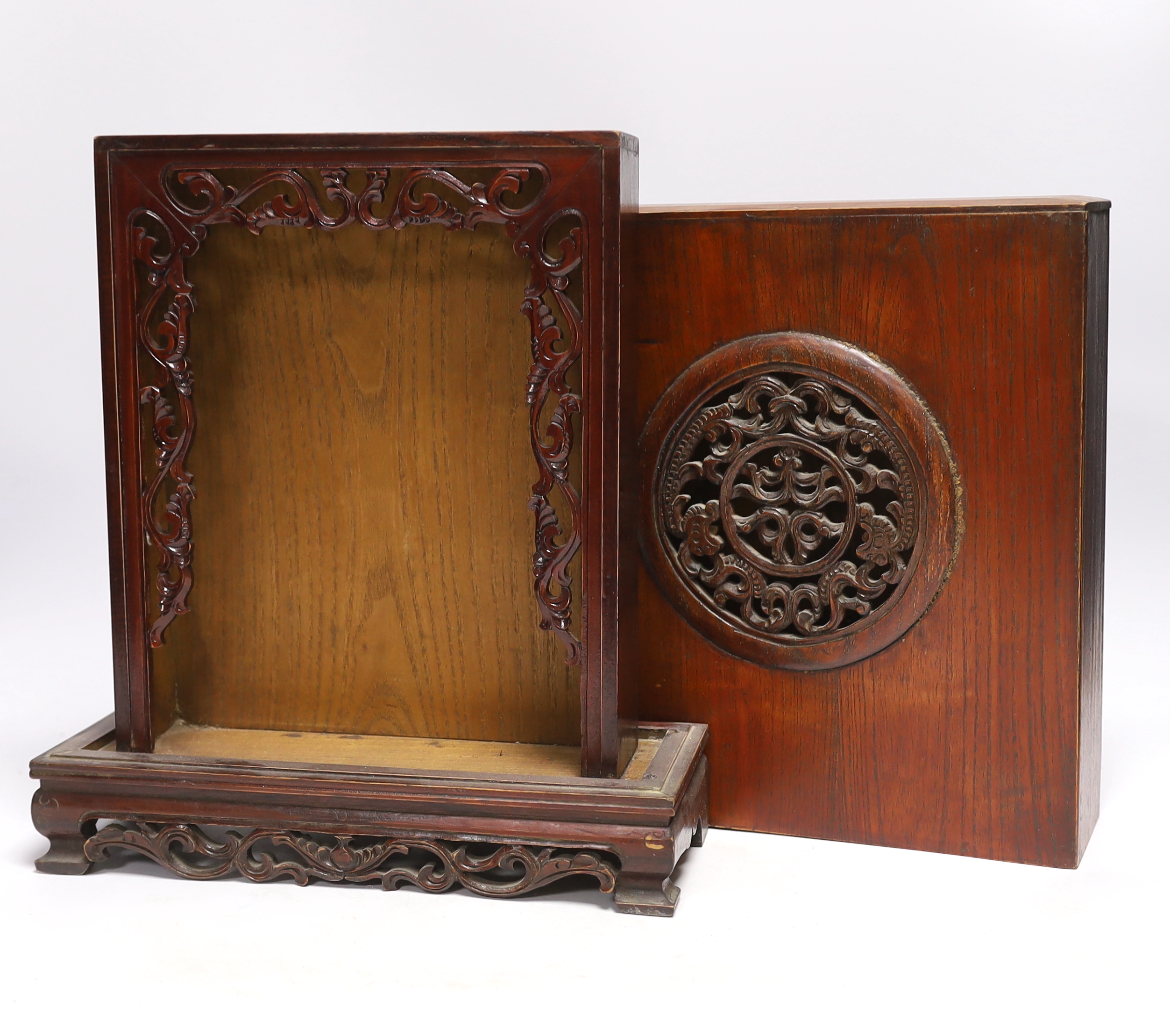 A Buddhist domestic carved hardwood shrine, 34cm high